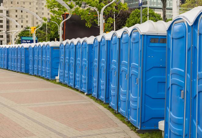 hygienic portable restrooms lined up at a music festival, providing comfort and convenience for attendees in Freeburg, PA